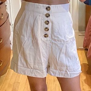 high waisted shorts with tortoise buttons